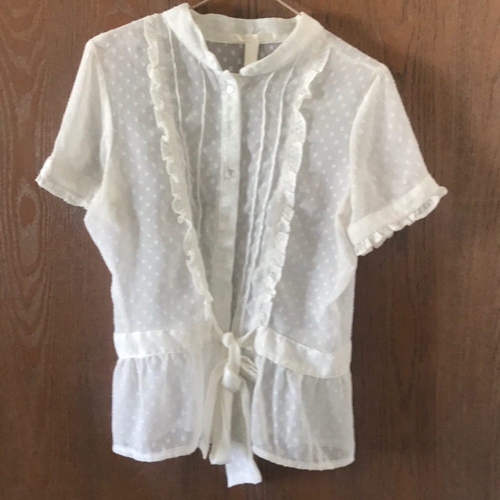 Sheer cream top.